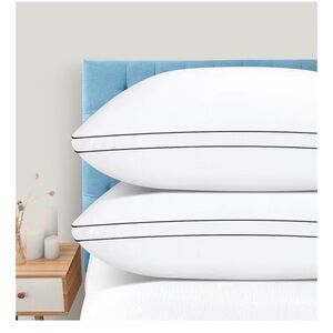 Elegant White Pillow Set with Black Trim